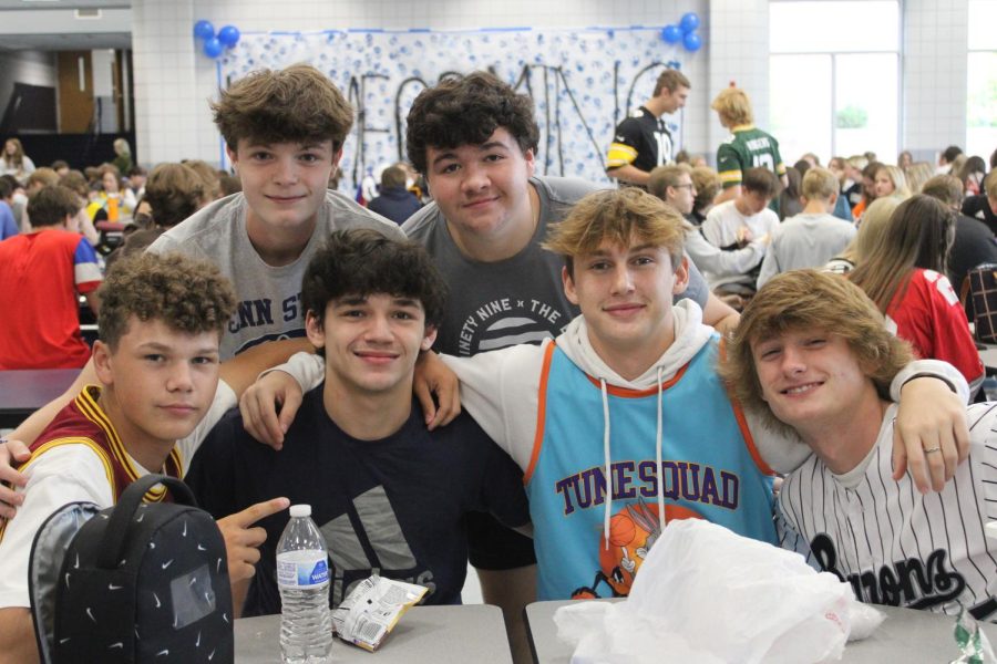 Seniors pose for a picture at lunch during spirit week. The theme of this day was Jersey, so students dressed in Jerseys to partake in spirit week. 