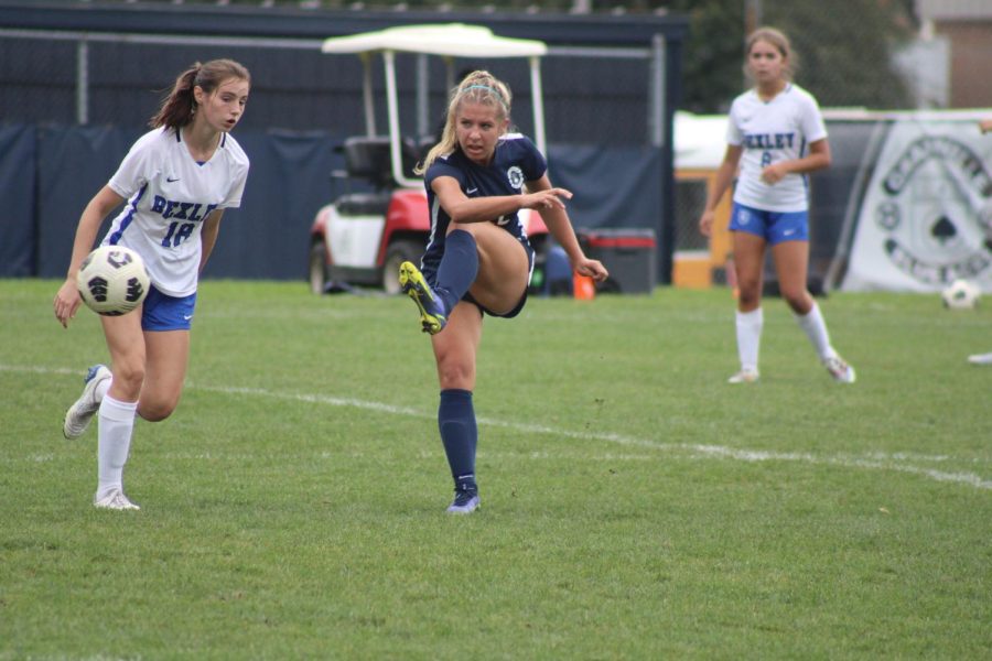 Junior Ava Labocki follows through on a shot against rival Bexley High School. Granville went on to win the game 4-2.