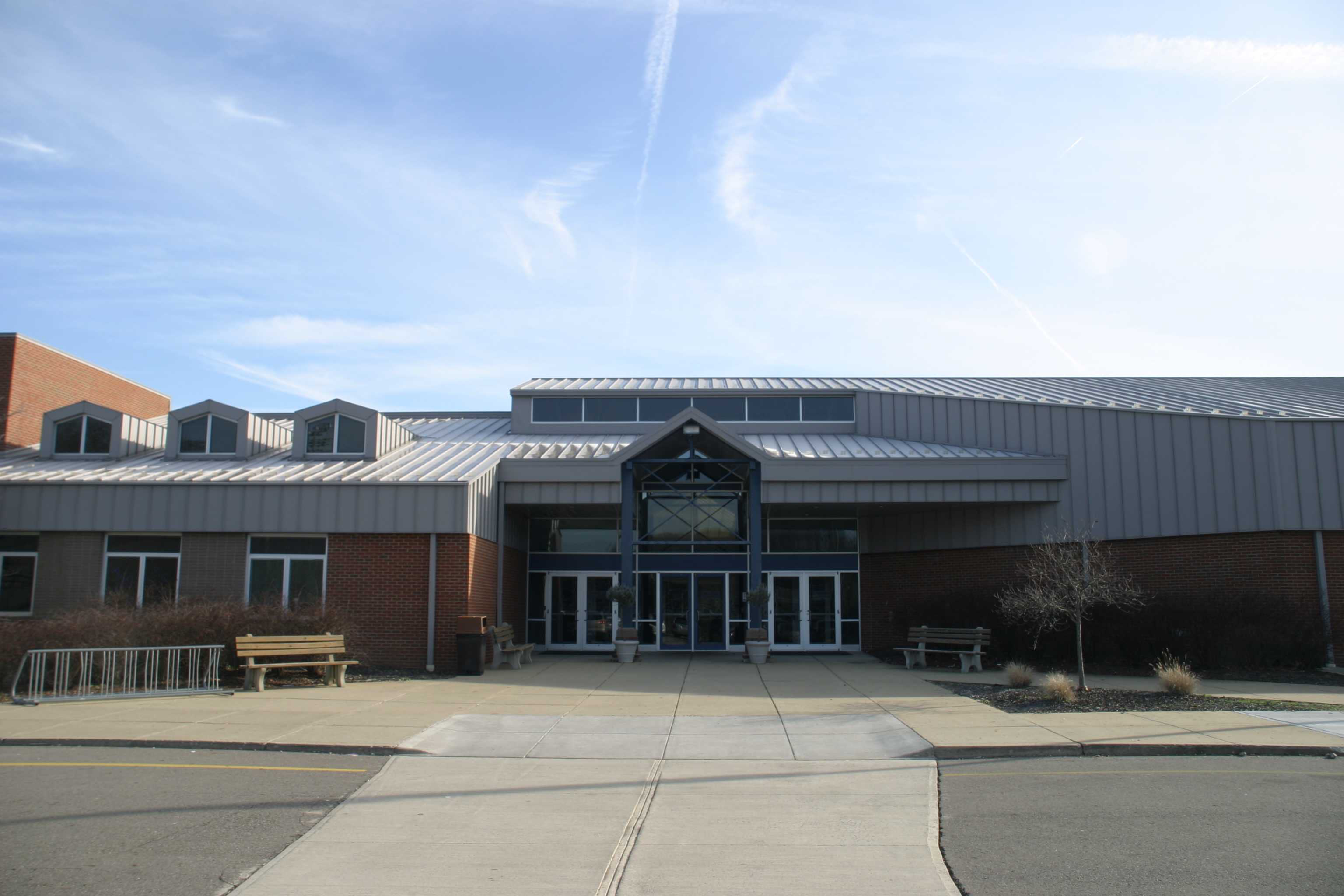 Gym floor damaged after high ball breaks sprinkler head