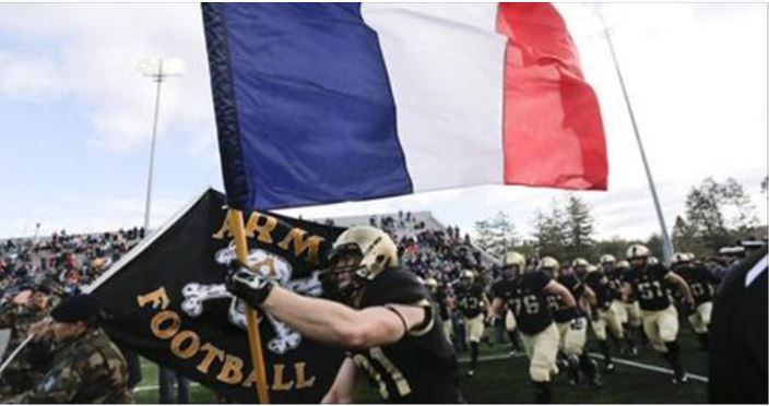 Football teams honor Paris