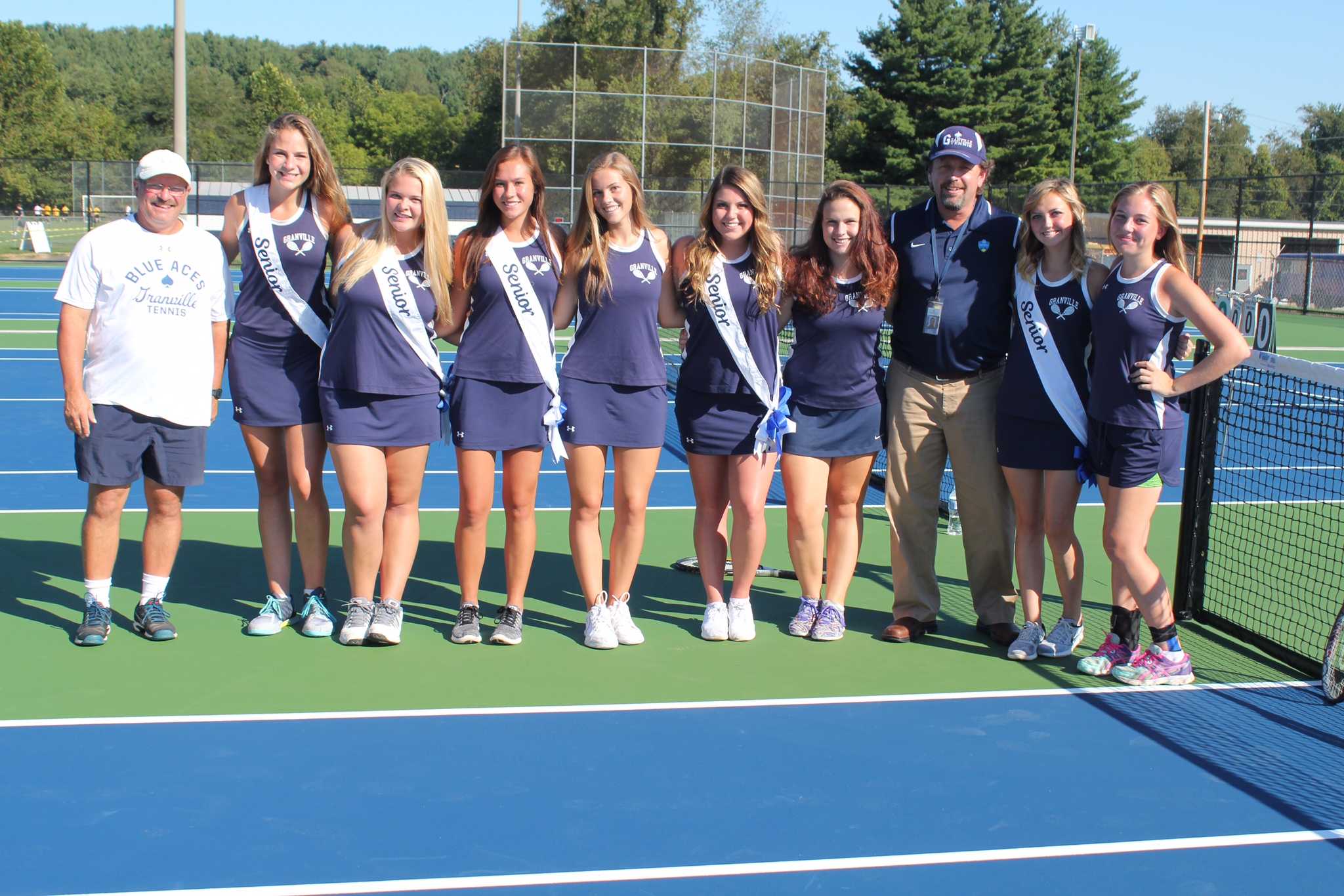 Hannah Dear- the BluePrints Entertainment Editor and Homeschooled senior- poses with her tennis teammates.