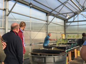 Environmental teacher Jim Reding on a tour through the green house