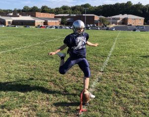 Freshman kicker Ella Dement prepares to kick a field goal in practice. She is the only girl on Granvilles high school football team. (PHOTO COURTESY OF TREVOR CRUMLEY)