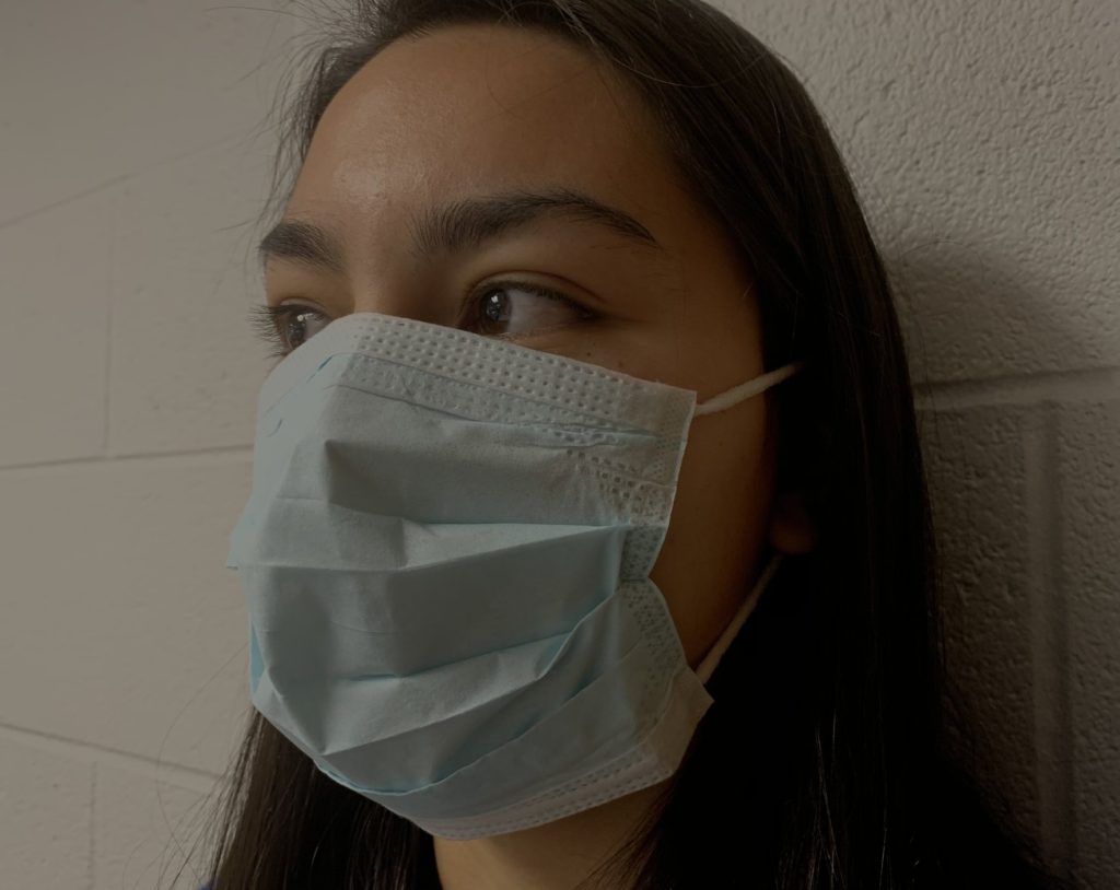 Sarah Carpenter wears a protective mask. (Faith Blankemeyer/BluePrints)