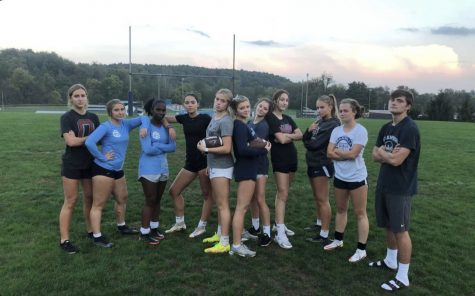 The Junior Powder Puff team practices for the game.