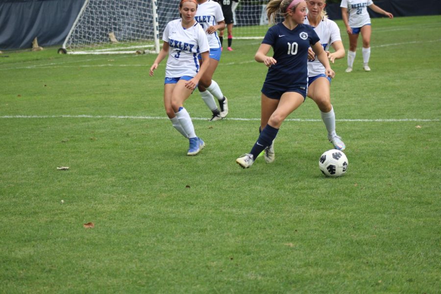 Sophomore Anna Nolan attempts to turn her defender in hopes to find a teammate. Granville went on to win the game 4-2.
