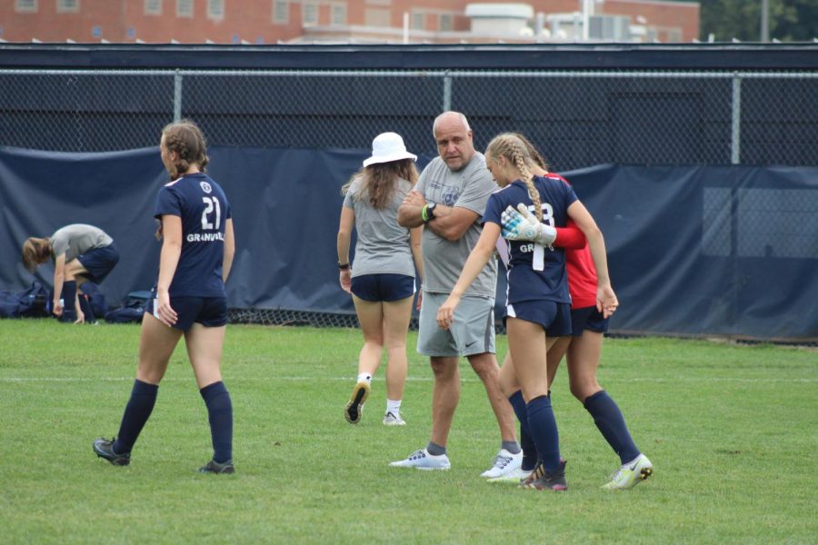 Freshmen Ayla Cook and Sydney Lauffer embrace after the first half of the game. The game was 4-1 at halftime and Granville secured the win at 4-2 by the end of the game.