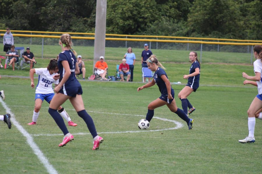 Junior Ava Labocki dribbles towards a defender as she approaches the goal. Granville went on to win the game 4-2.