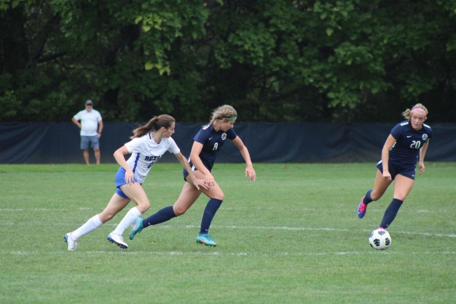 Junior Allie Messner races an opponent to the ball. Granville went on to win the game 4-2.