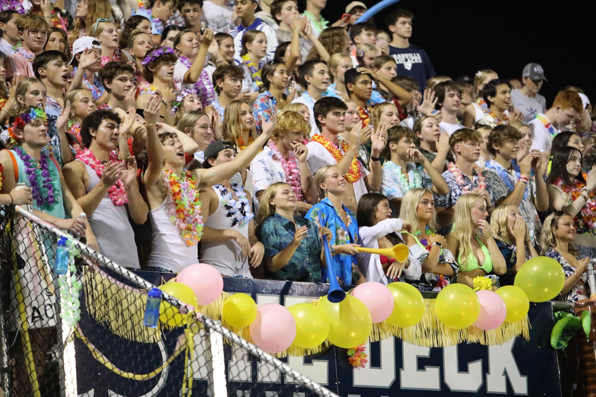 The Granville student section cheers on the football team at the first home game. Students were reacting to a play. "We are one of the best student sections I've seen" Principal Scott Hinton said