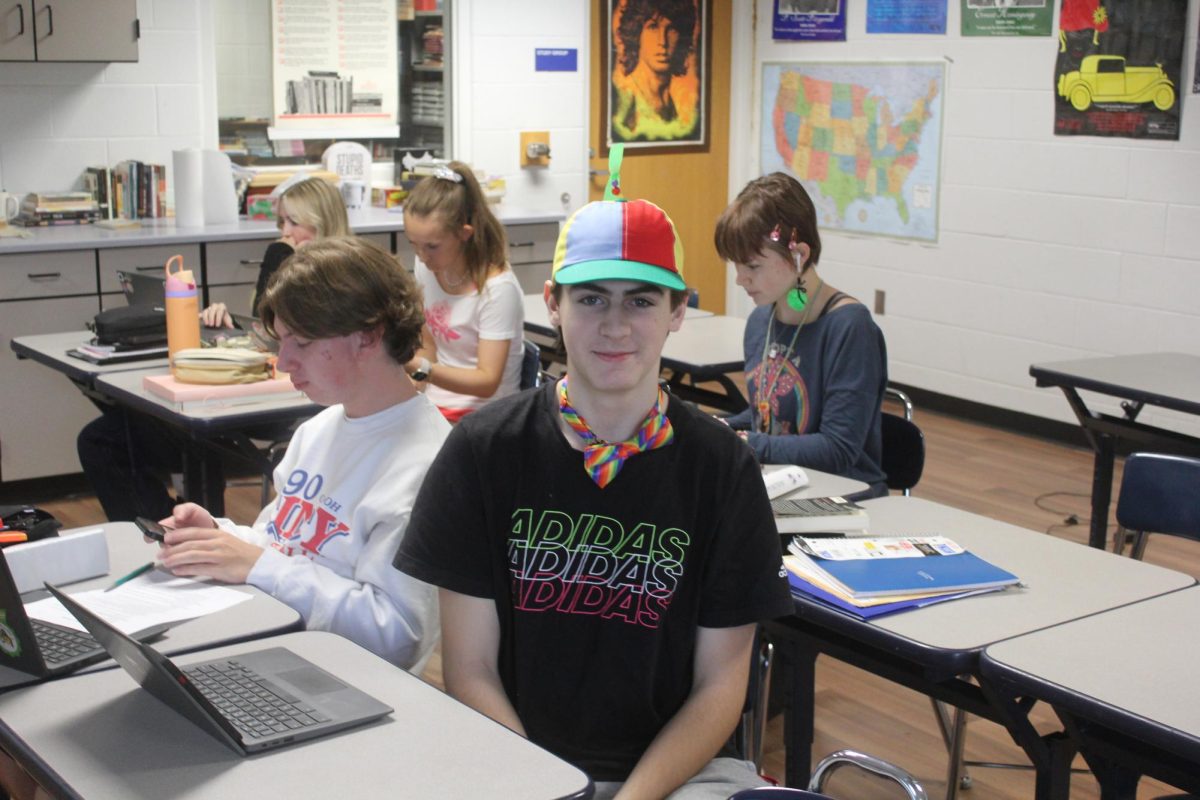 Davis Williamson styles his propeller hat. 