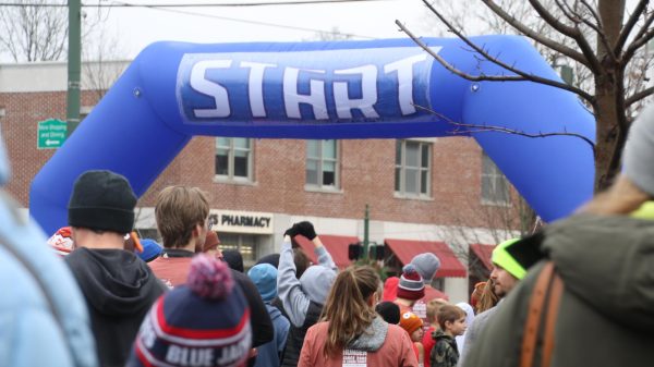 Runners line up at the start of the Granville Turkey Trot on Thanksgiving morning. This event has become a Thanksgiving tradition for many Granville families. 