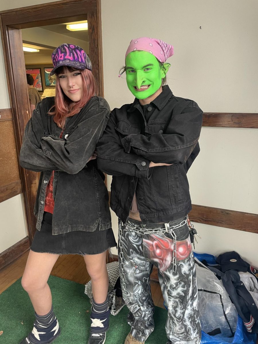 Lisp Goblin and senior Sage Kennedy pose after he made her custom hat.