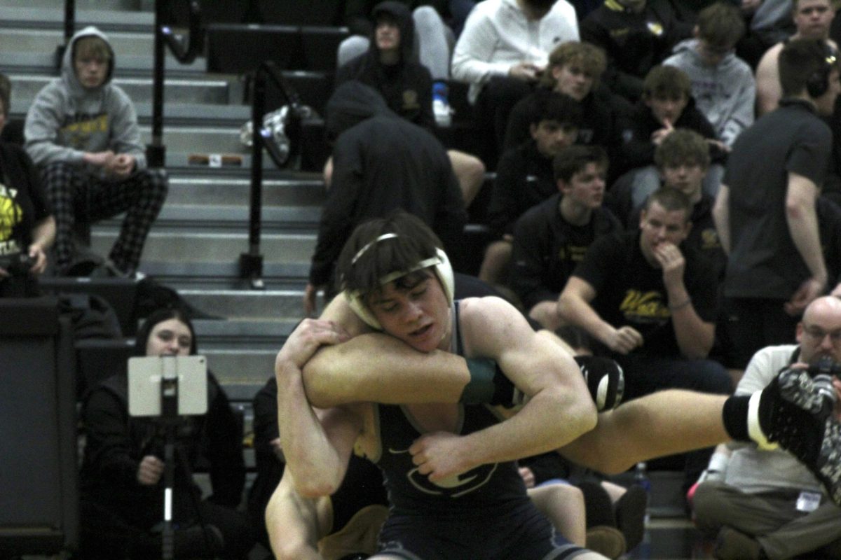 blank blank blank takes down his opponent with great strength. 