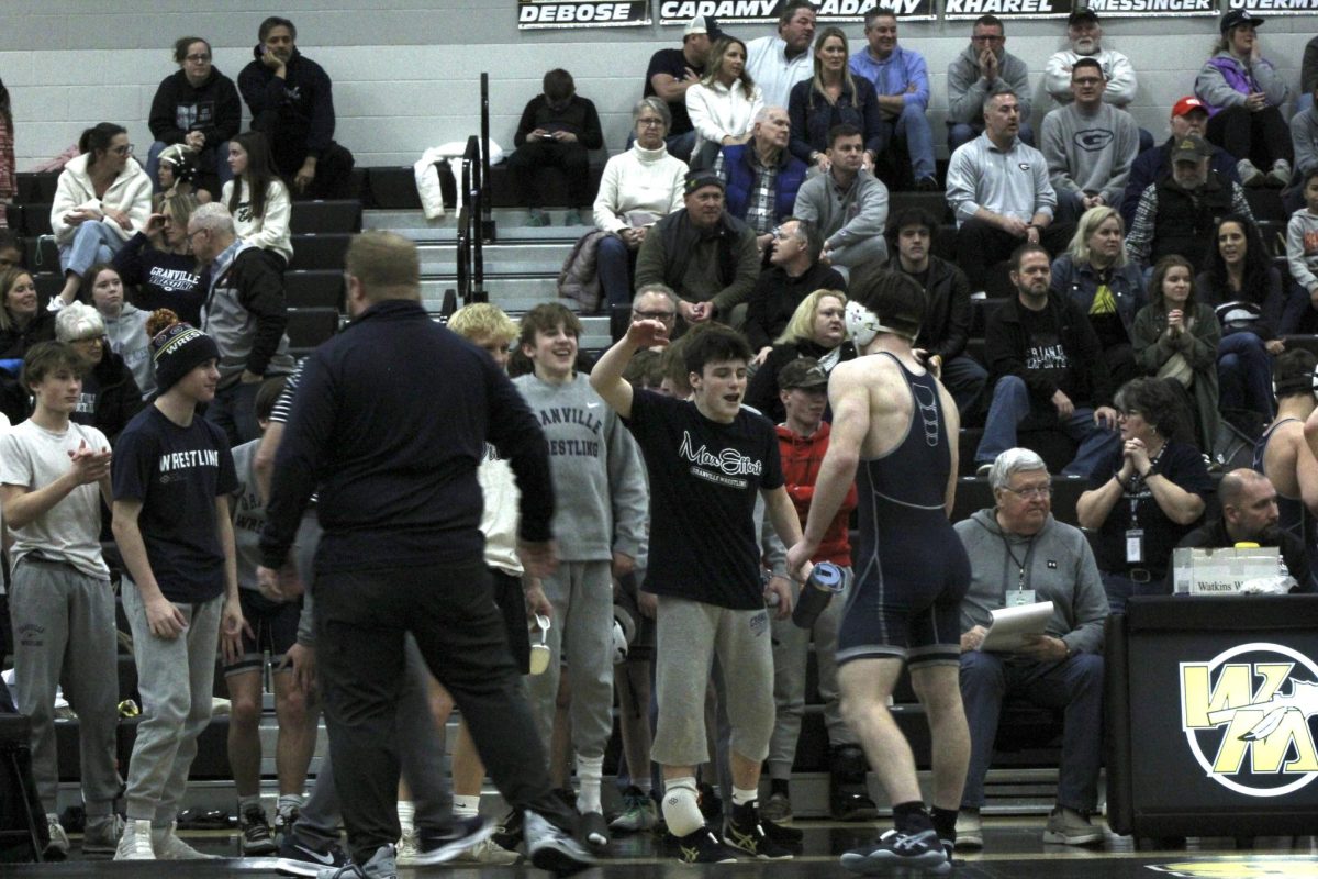 Blank Blank Blbank and blank blank blank high five after a match. 