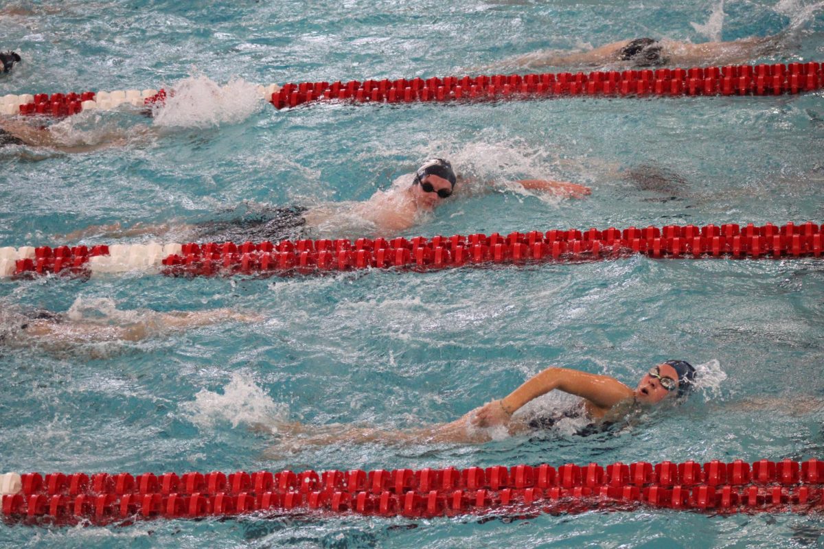 The team kicks off the meet by warming up their strokes before the events begin. Granville sets new records, brings home new trophies, and swimmers Lydia Sturgeon and Nolan Schneider are crowned LCL swimmers of the year. 