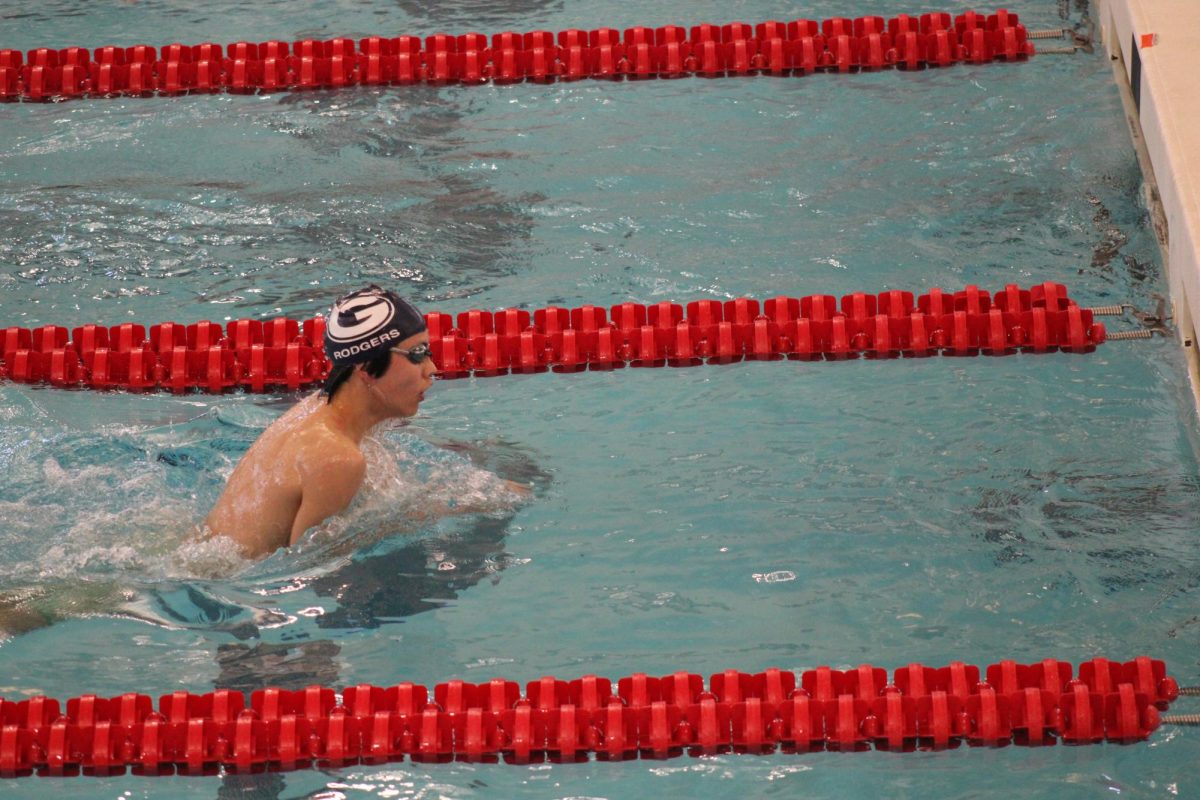 Sebastian Rodgers (11) does his breaststroke down the lane. Granville sets new records, brings home new trophies, and swimmers Lydia Sturgeon and Nolan Schneider are crowned LCL swimmers of the year. 