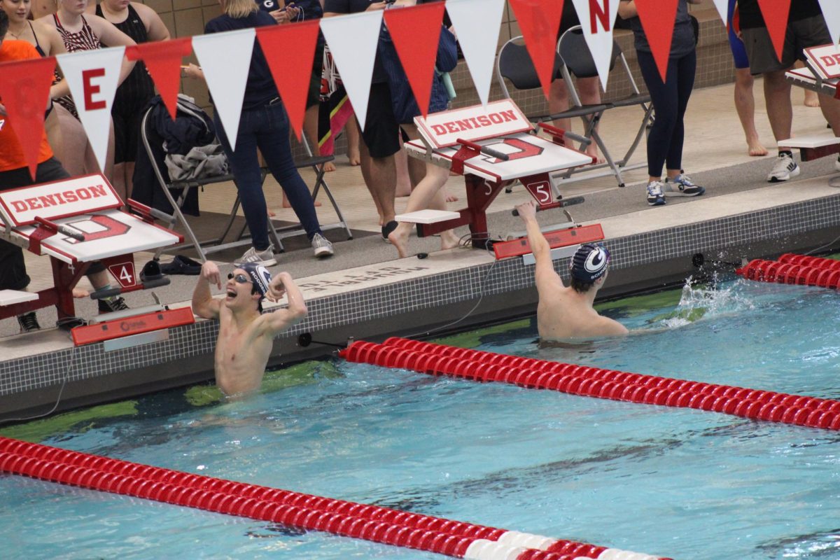Oliver Rodgers (10) flexes at the cheering crowd after finishing his heat with teammate Nolan Schneider. Granville sets new records, brings home new trophies, and swimmers Lydia Sturgeon and Nolan Schneider are crowned LCL swimmers of the year. 