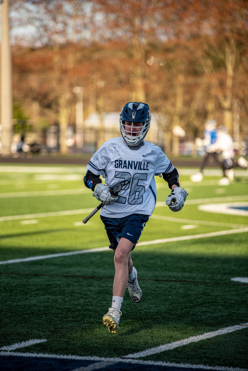 Jude Butcher runs off the field to sub out.