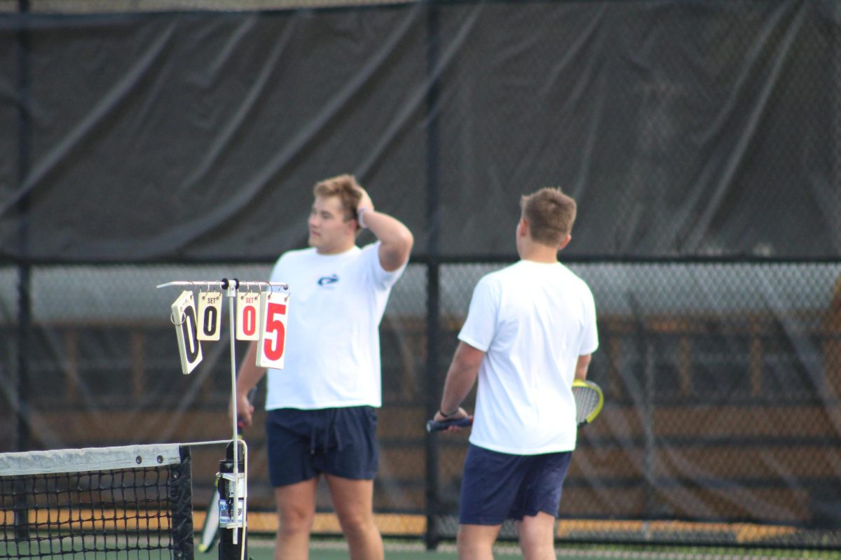 Kyle Kirby and his partner Connor Kirby wait for the next match together. 