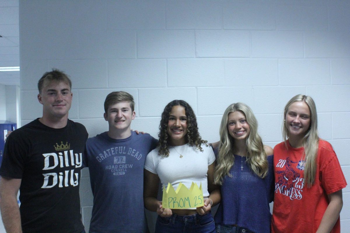 The 20205 prom court! Dylan Lane, Connor Hare, Nora Carrington, Sophia Polling, and Cora Tackett pose with their crown. Not pictured Corbin Bell who goes to CTEC. 