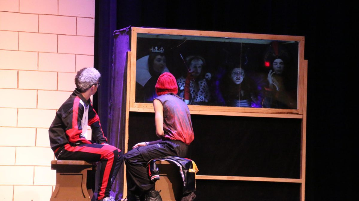 Andrew Busack (10) and Max Holtsberry (11) sit on a tense video call with their villainous parents. 