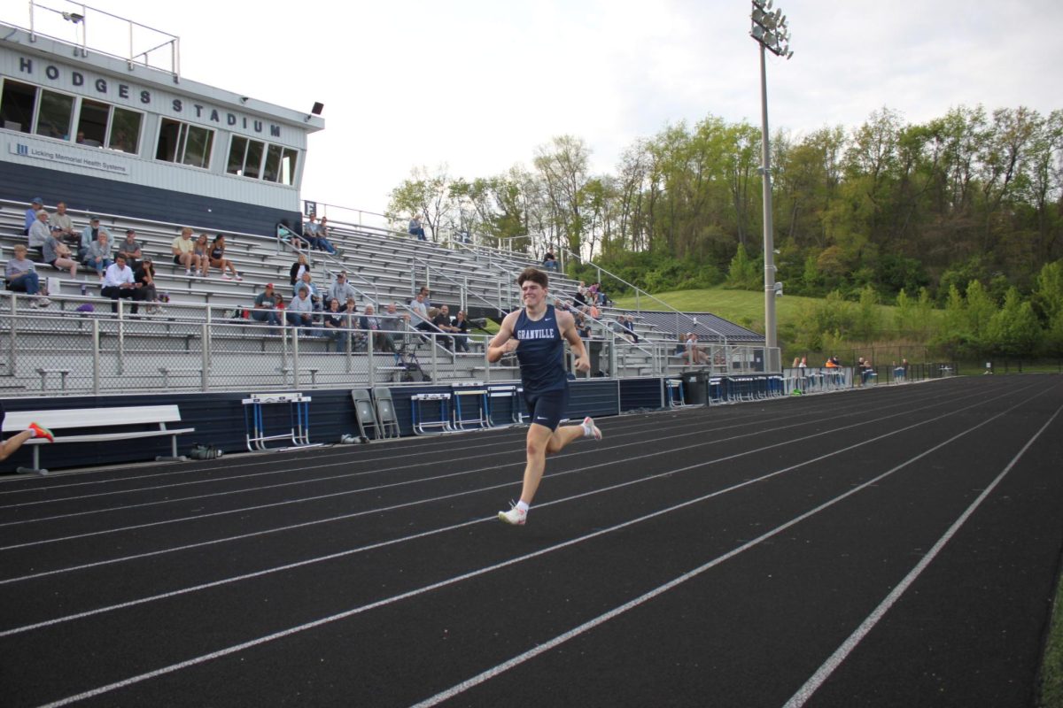 Freshman Garret Hannahs runs the 4x400m.