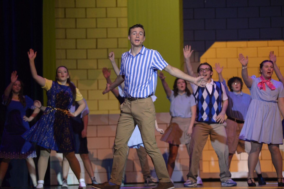 Grant Timmons (9), who plays Cinderella's son Chad, is front and center during the "Be Our Guest" performance to welcome the Evils to Auradon. 