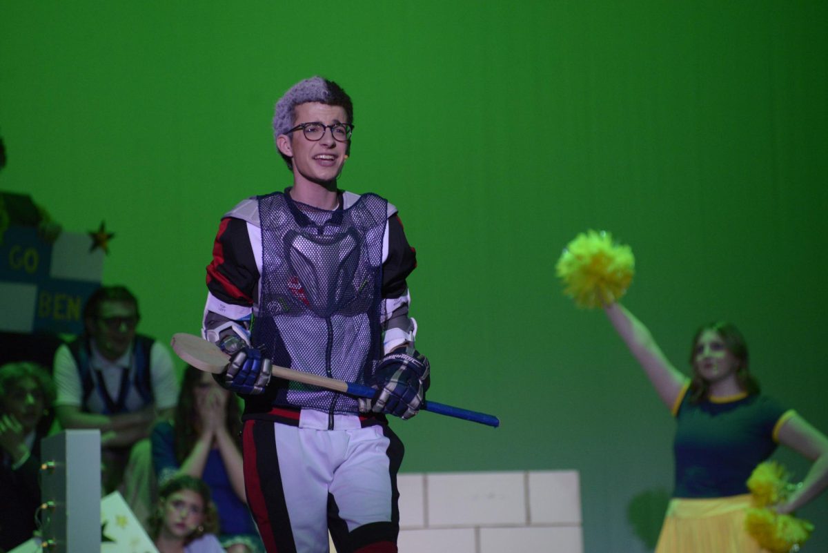 Carlos, played by Andrew Busack (10),  plays in his first tourney game. 
