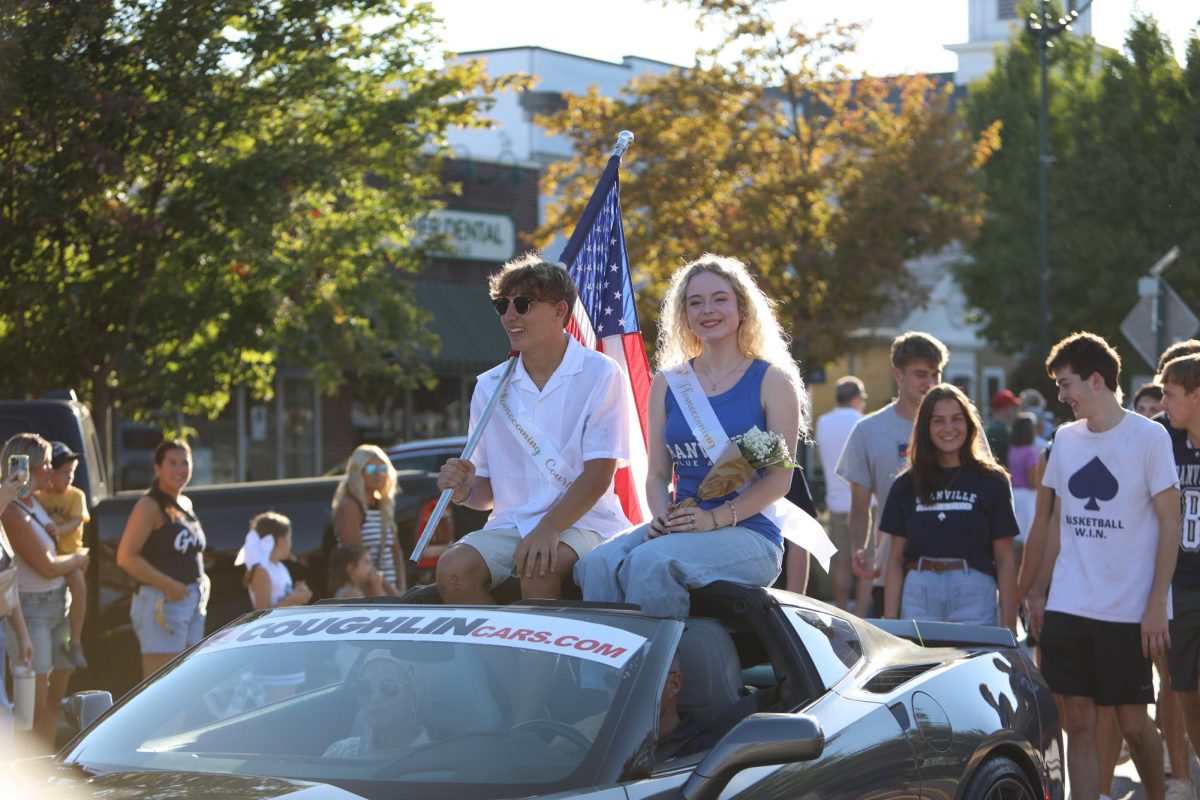 As they pass friends and family, seniors Landon Goss and Andi Salisbury smile bright. They were two of six seniors nominated for Homecoming court.