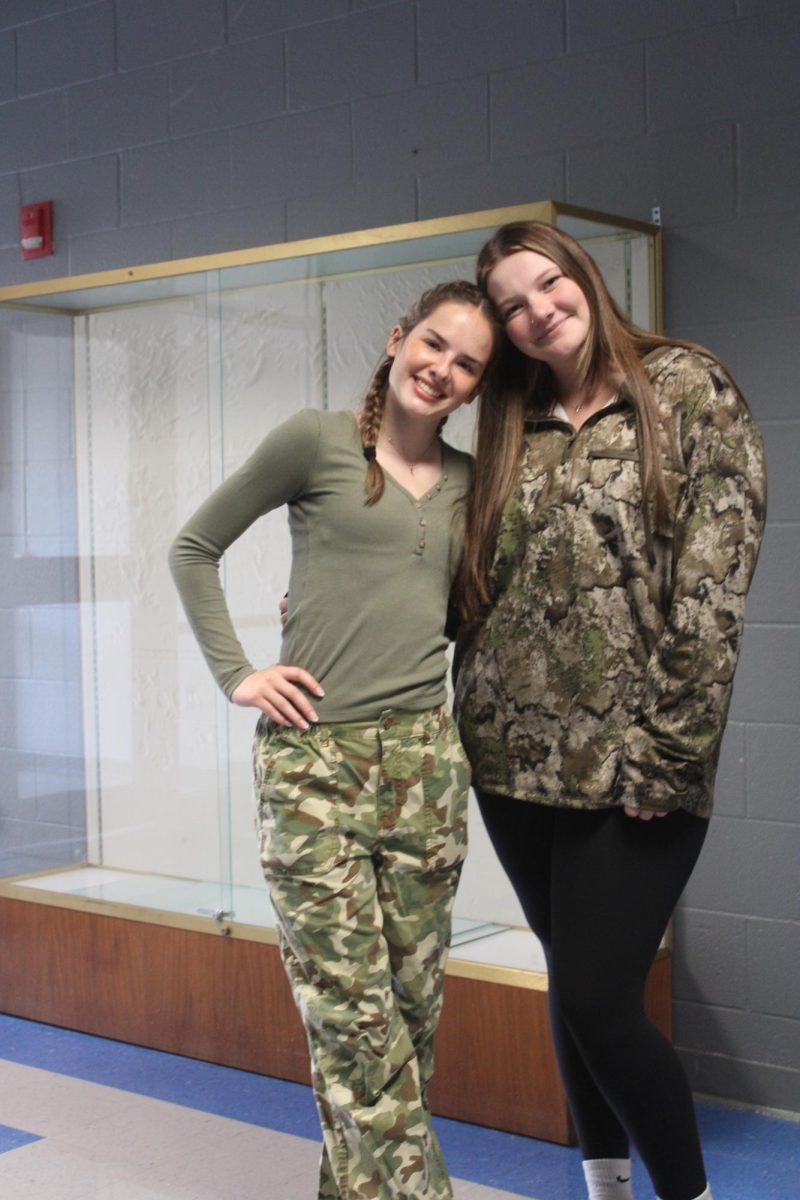 Seniors Ruby Goodwin and MacKenzie BeVier wear camo on Homecoming Spirit Week. Camo Day was on Tuesday, Sept. 16.