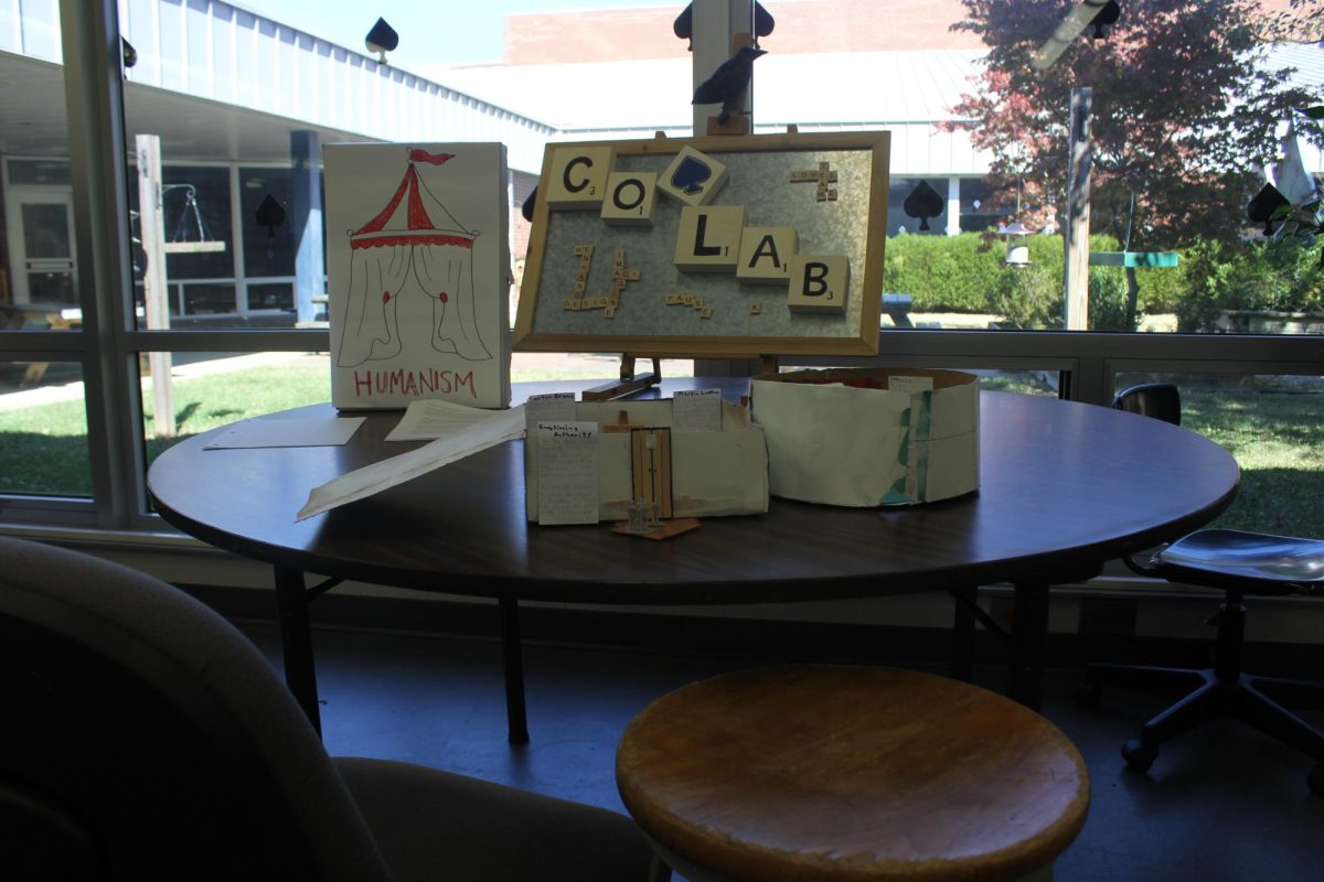Students collaborate together to create a project for their class.