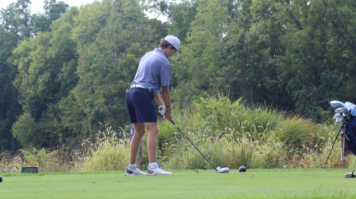 Sophomore Stephen Joseph sets up to tee off.