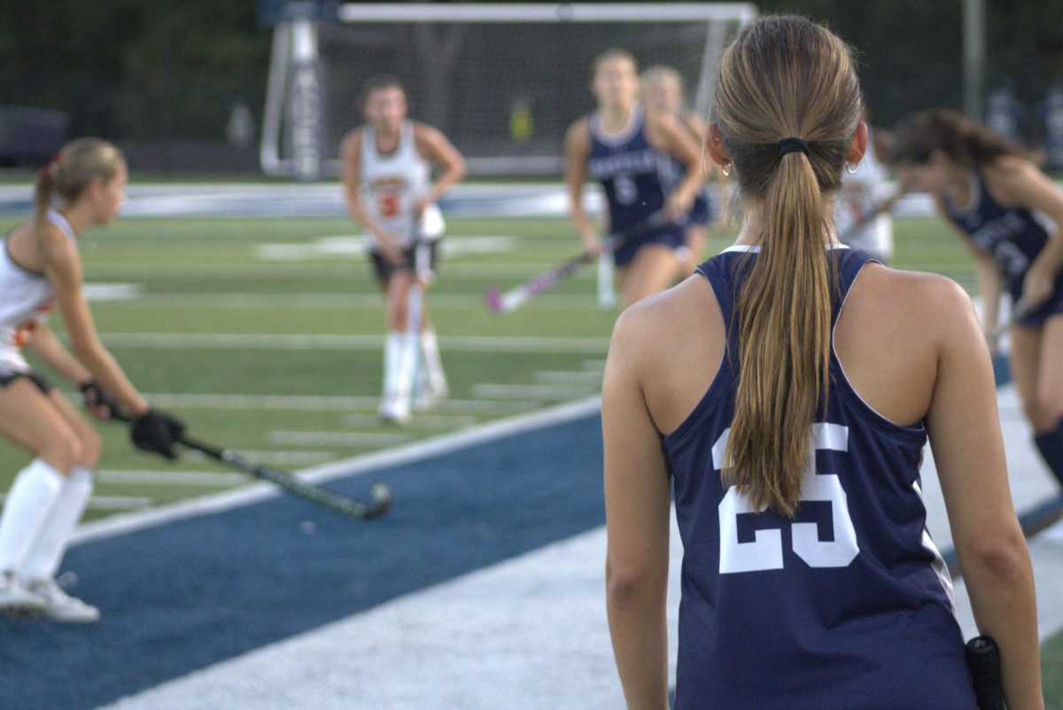 Sophomore Lucy Ehrmin watches over the field. Granville field hockey Senior night