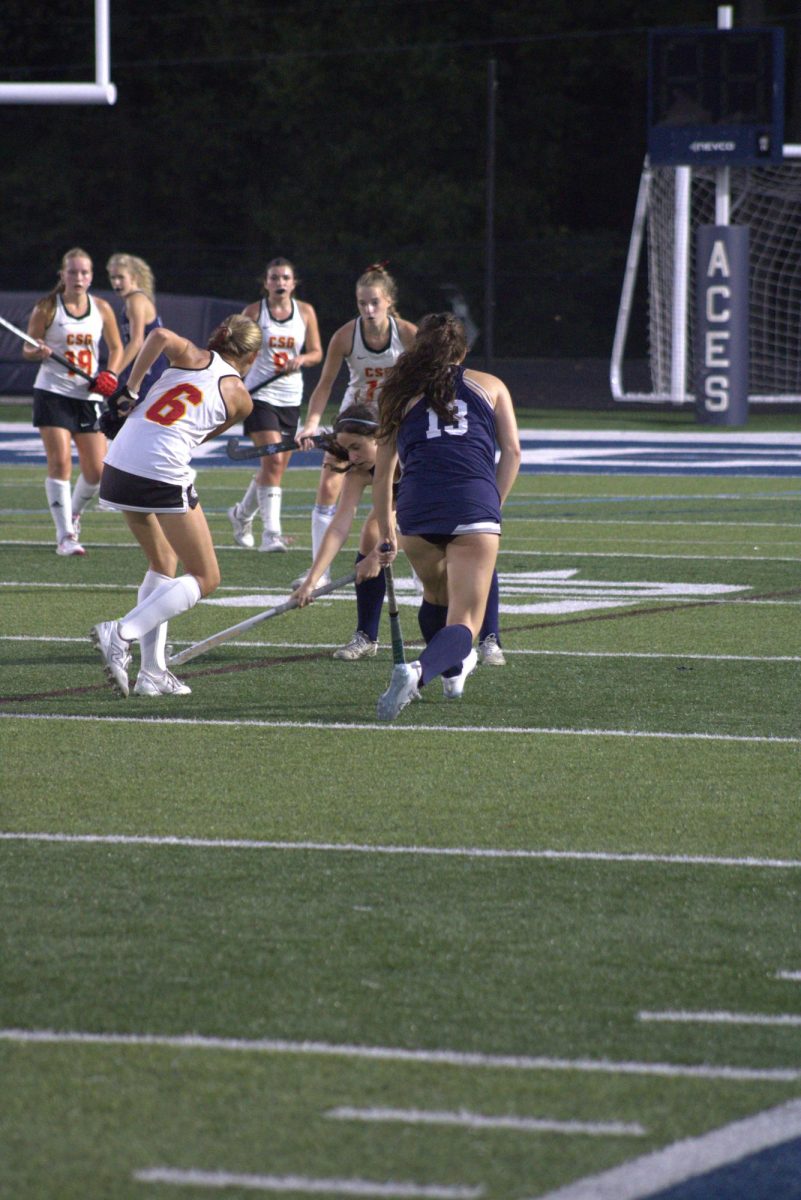 Ava Dobbins battling over the ball. Granville field hockey Senior night. 