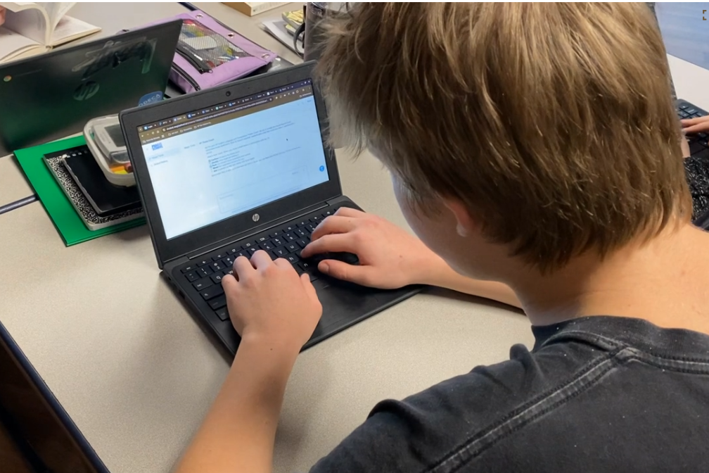 Noah Sobjack uses AI to refine his American Dream research paper during English class. 