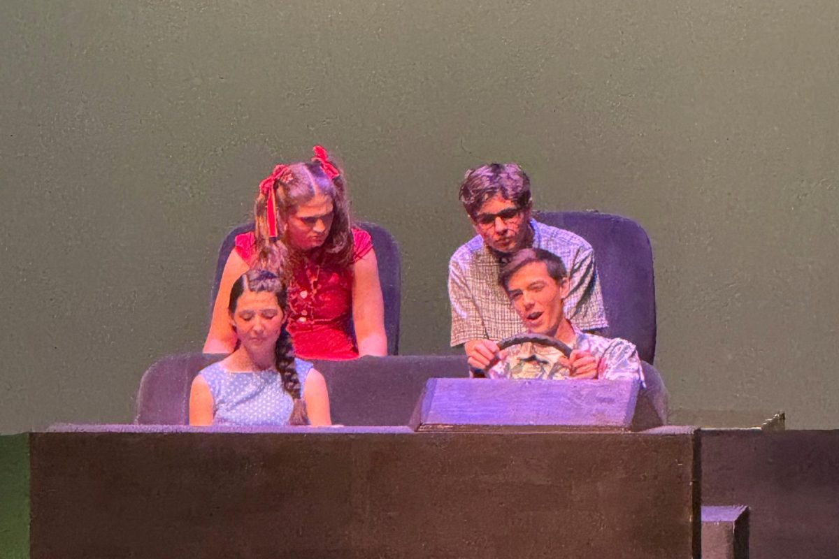 Owen Costa, Aubrey Baus, Violet Schneider and Gavin Rafter perform as the Browning family of the past. Photo courtesy of Mrs. Rodocker.
