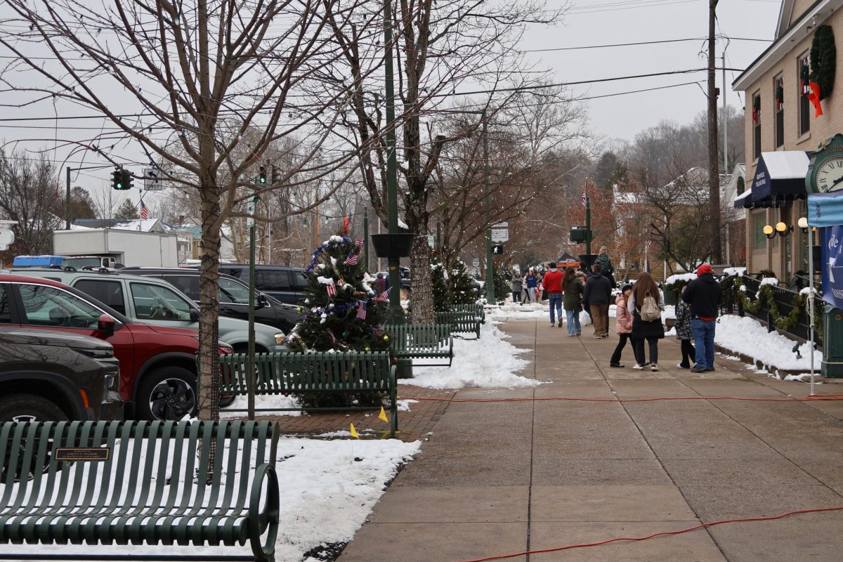 People gather and walk together as they enjoy all the festivities around Granville.