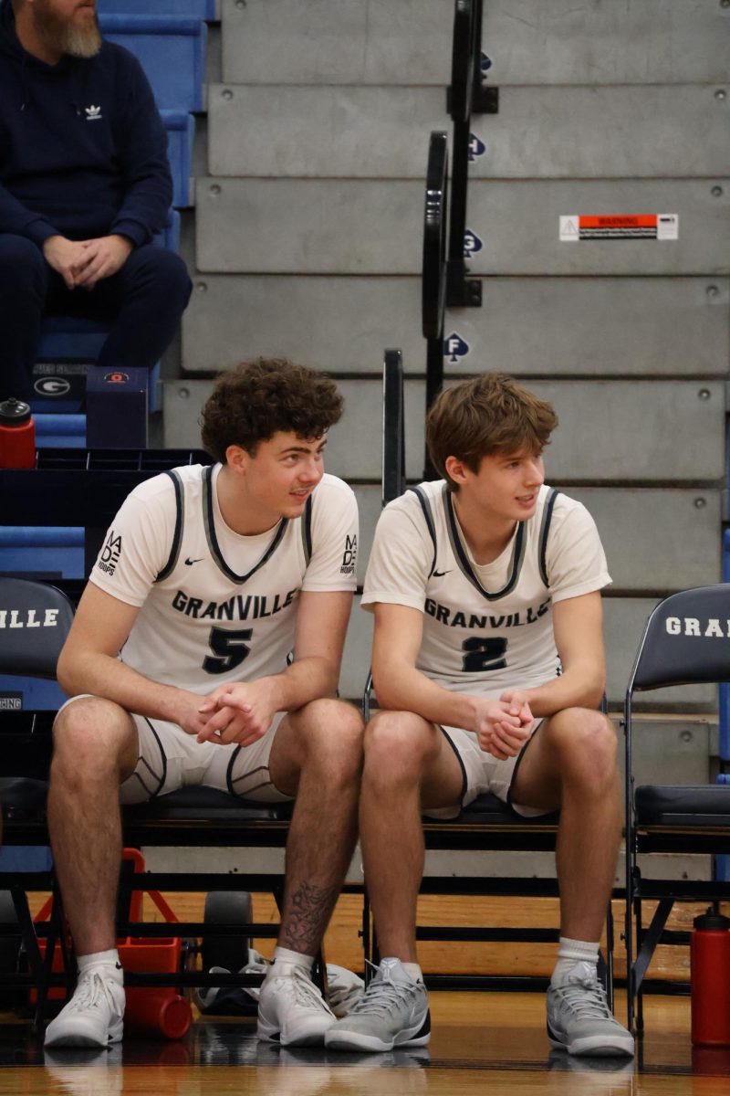 Juniors Frankie Annarino and Patrick McCarthy talk together on the sideline. The two have been playing basketball together for 6 years.