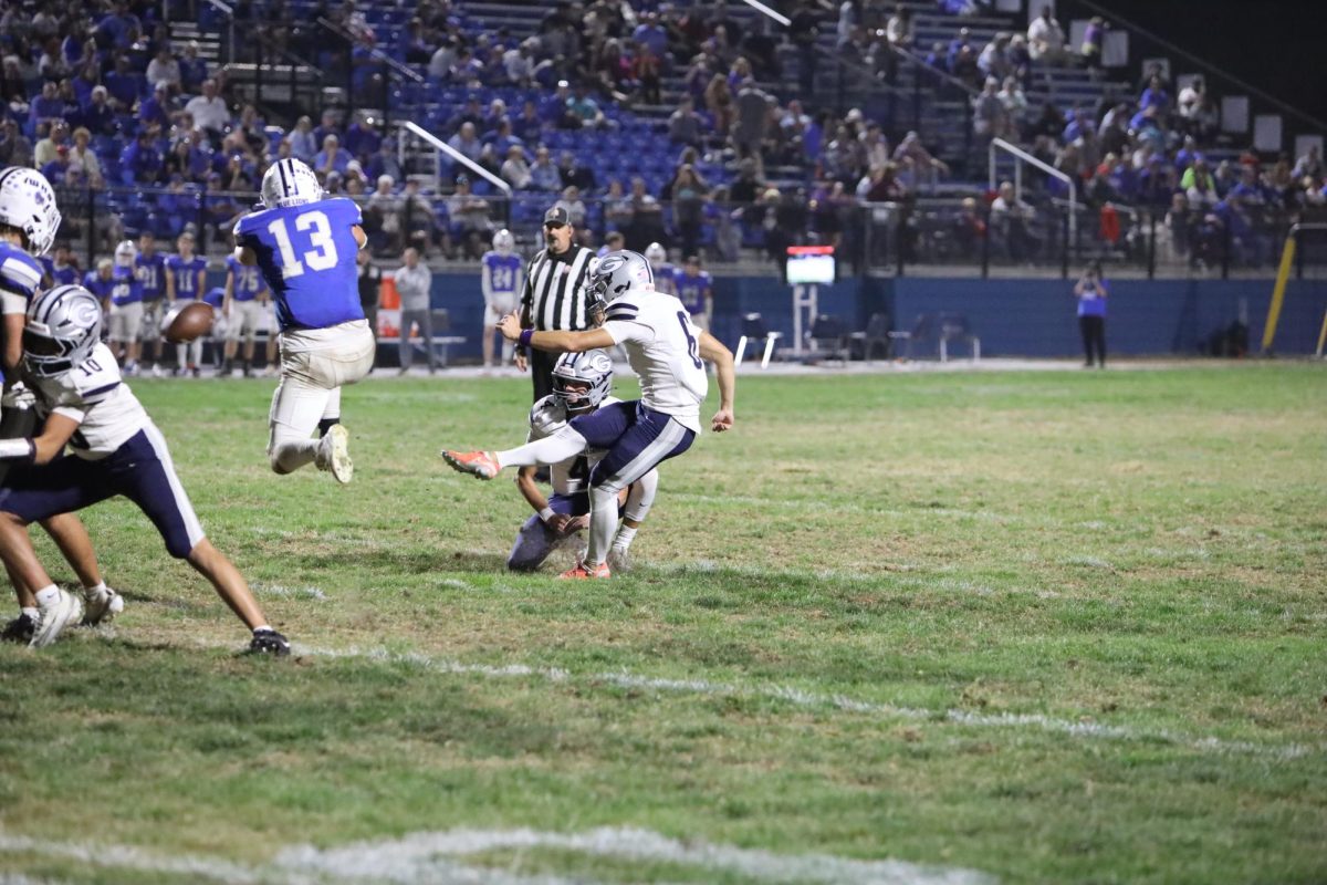 Senior Bode Shoaps kicks the field goal to try for the extra point. Shoaps is an ESPN top ten kicker and a 5 star athlete and committed to University of Louisville. 