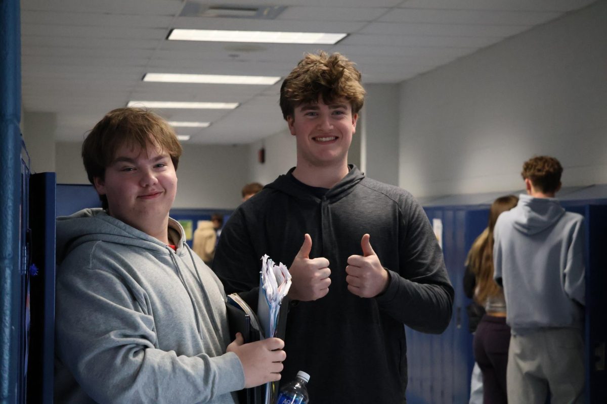 Juniors Zane Schilling and Jackson McMillan meet at their lockers after lunch. These best friends smiled for the picture.