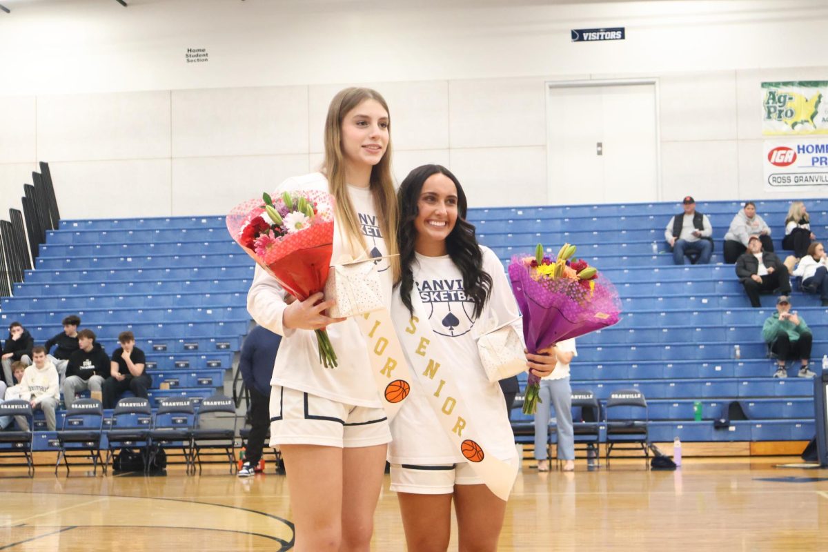 Senior smiles! Delaney Varrasso and Sophia Hall cheese up for a picture. Both seniors have grown up together through the sport and now ending there high school career together.