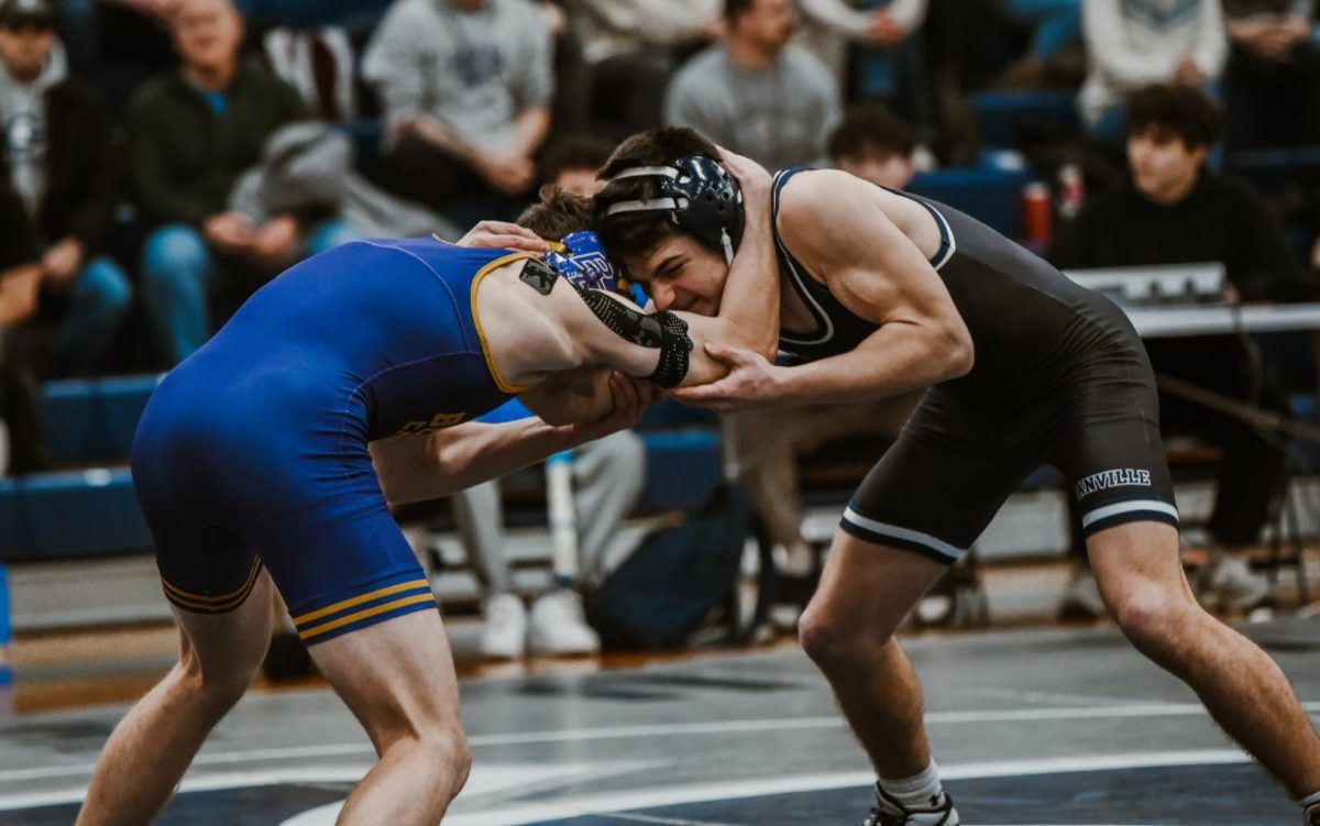 Dane Mcshane taking down his opponent. They will go on as a team and have a tough loss to Bloom Carroll. 