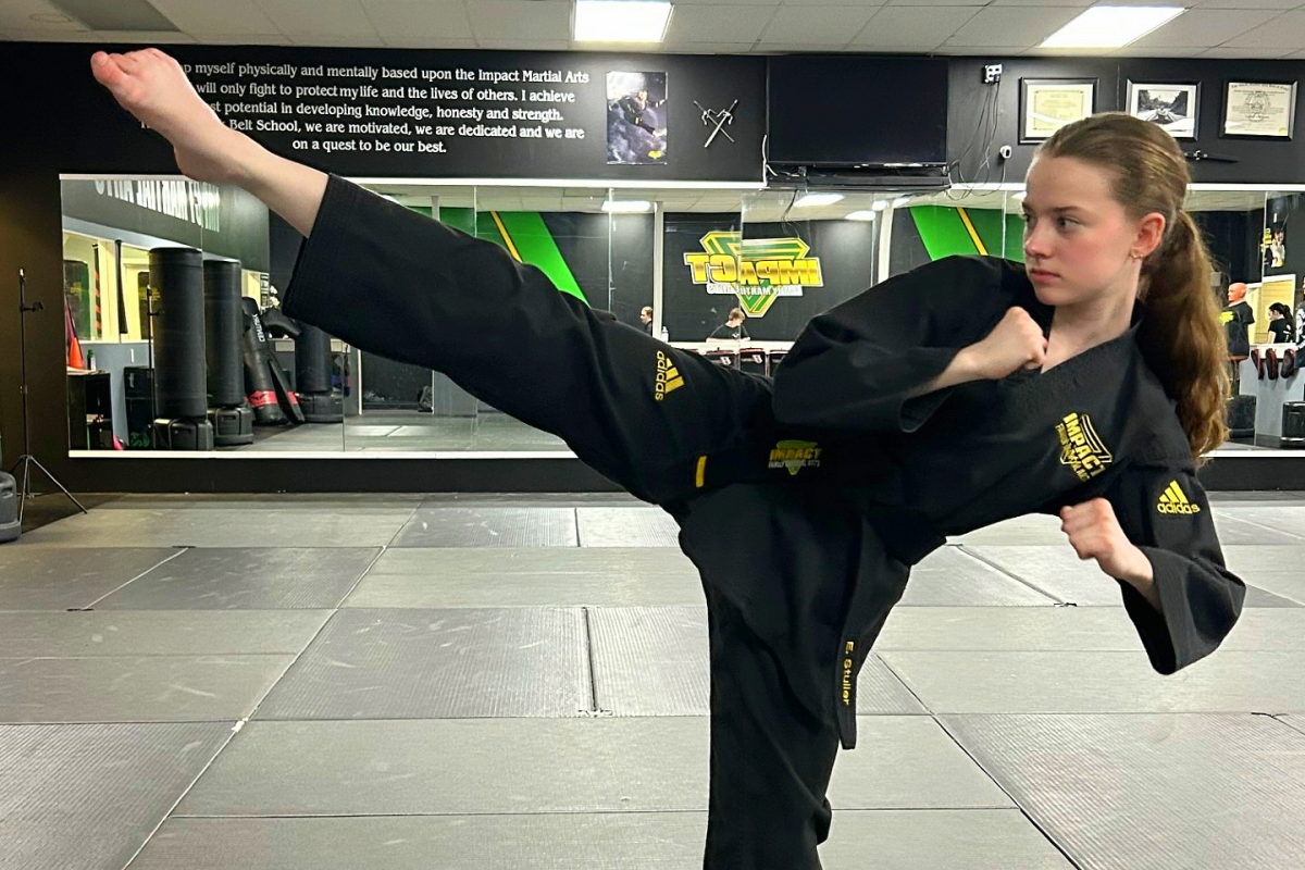 Junior Ella Stuller poses to demonstrate a karate move. Photo courtesy of Ella Stuller.