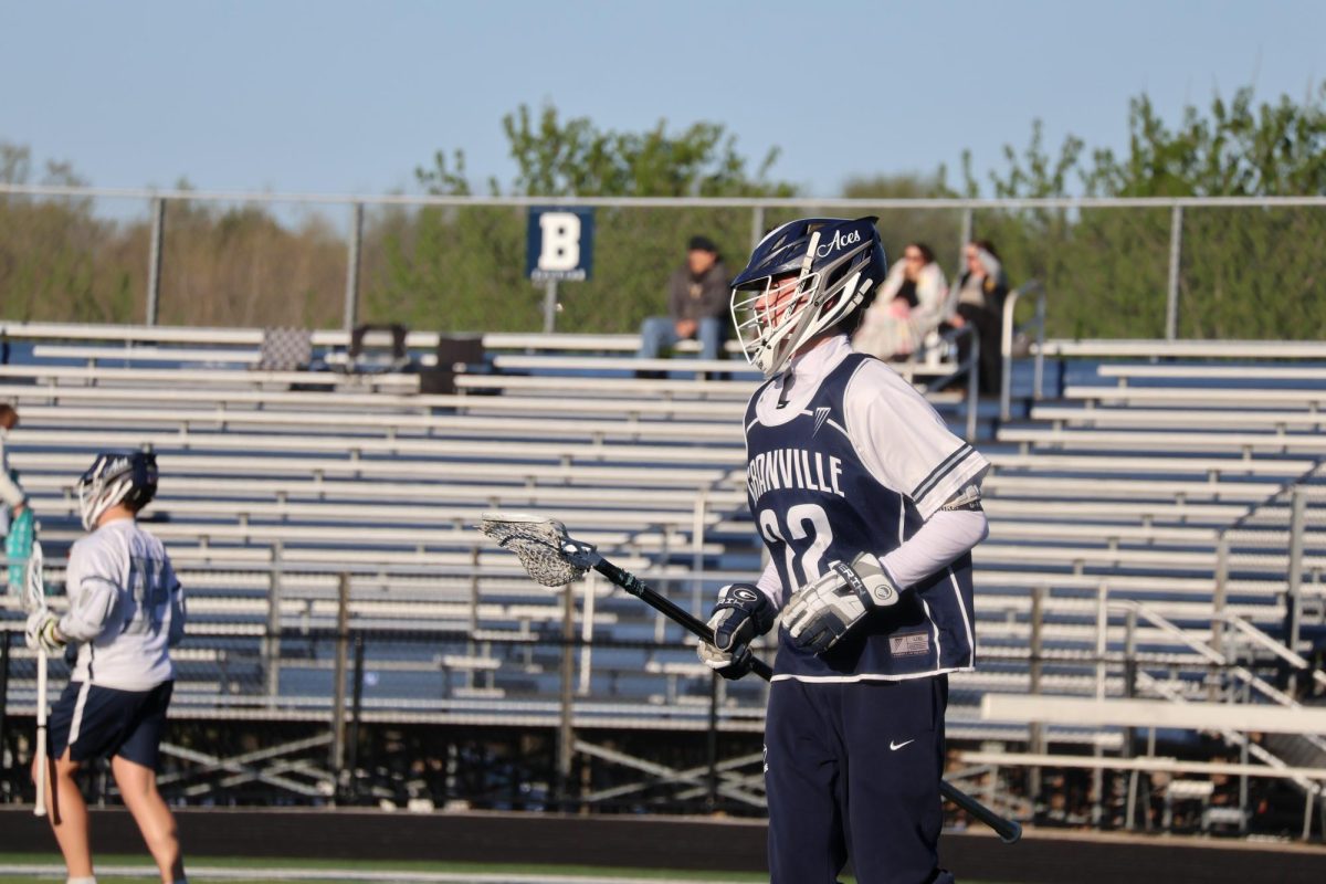 Junior Carson Fox looks for the next play as he sets himself up. Fox has been working hard on defense to stop shots and passes.