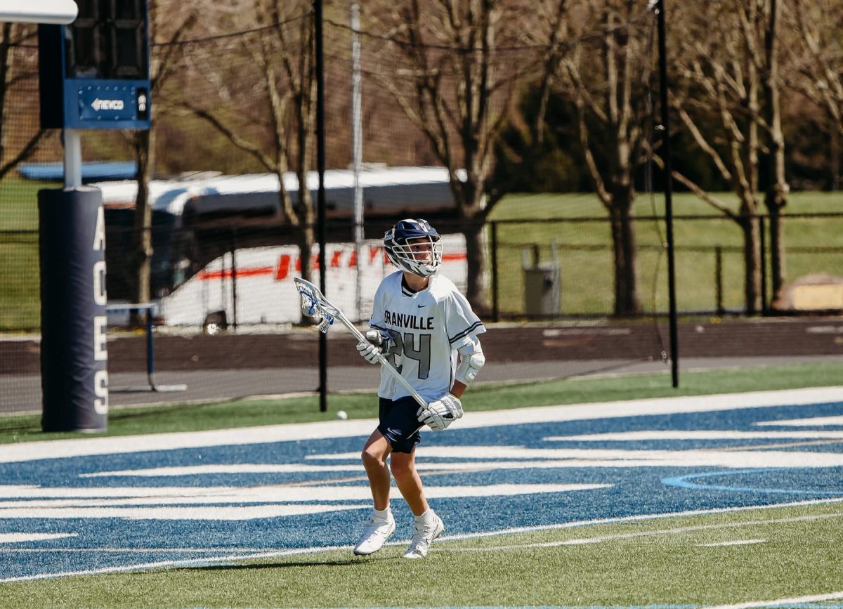 Daxyn Miller looks for the pass to score. They lost to Columbus Academy 10-4.
