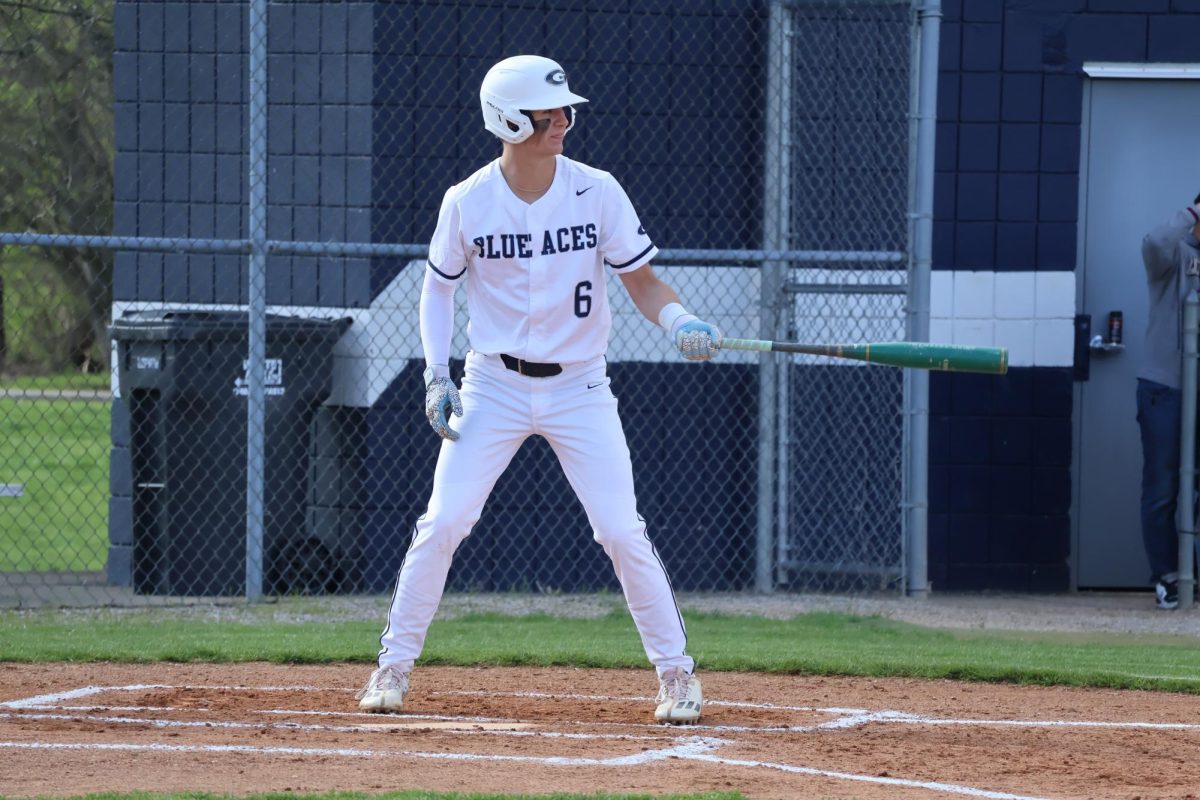 Senior Jakob Culver digs in the batters box, eyes locked in as he waits for the pitch. With his stance set and the bat ready to hit, he was looking to drive the ball into the gap for the Blue Aces.