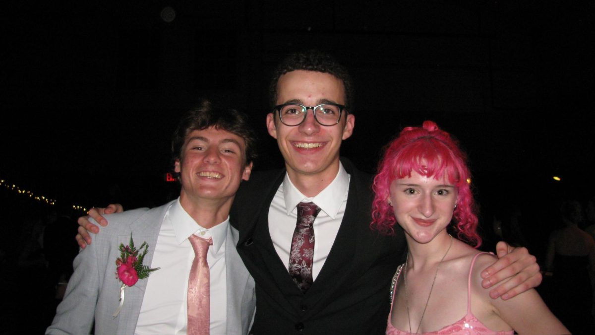 Junior class president Andrew Busack poses at Prom with Grant Timmons and Elliott Smith. Photo courtesy of E.B. Smith.